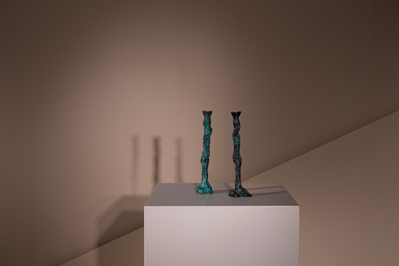 ARGONES. Candelabros de bronce