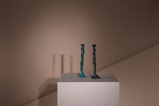 ARGONES. Candelabros de bronce